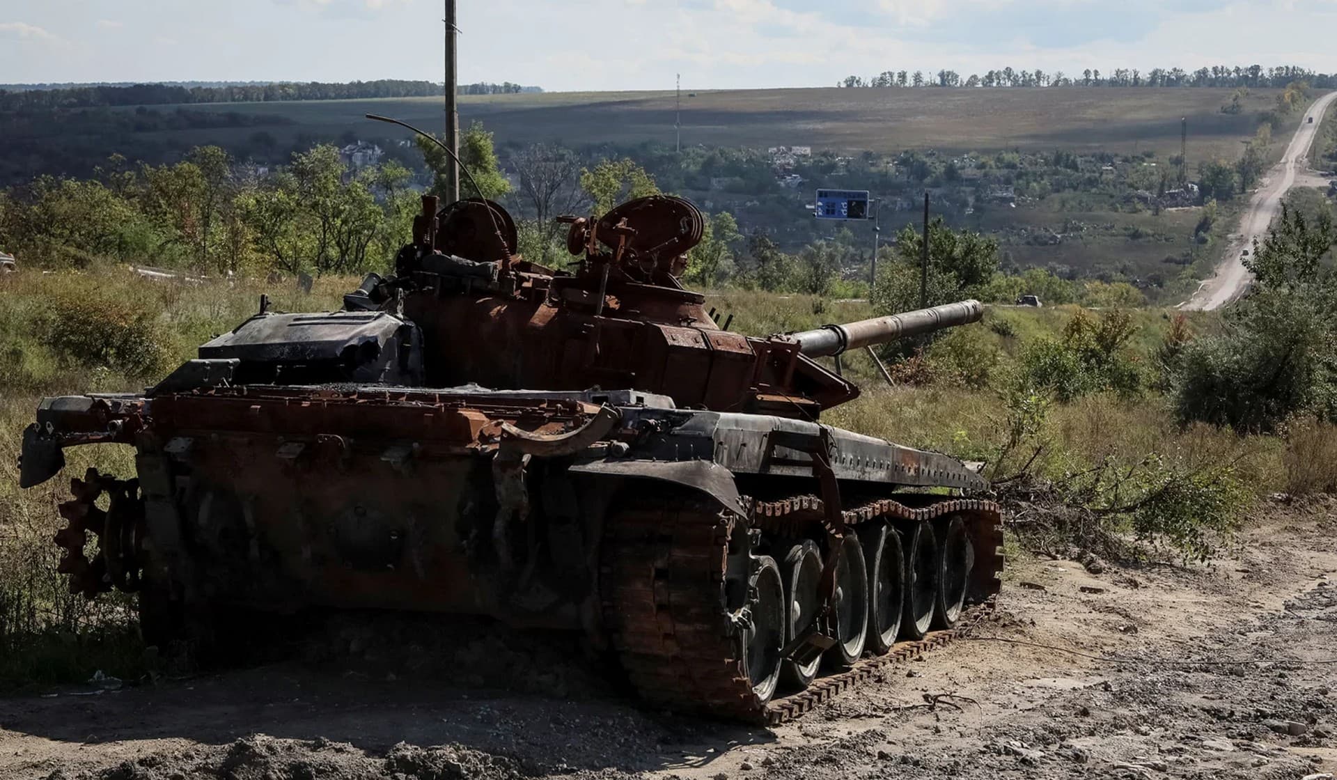 A destroyed Russian tank near the village of Kamyanka
