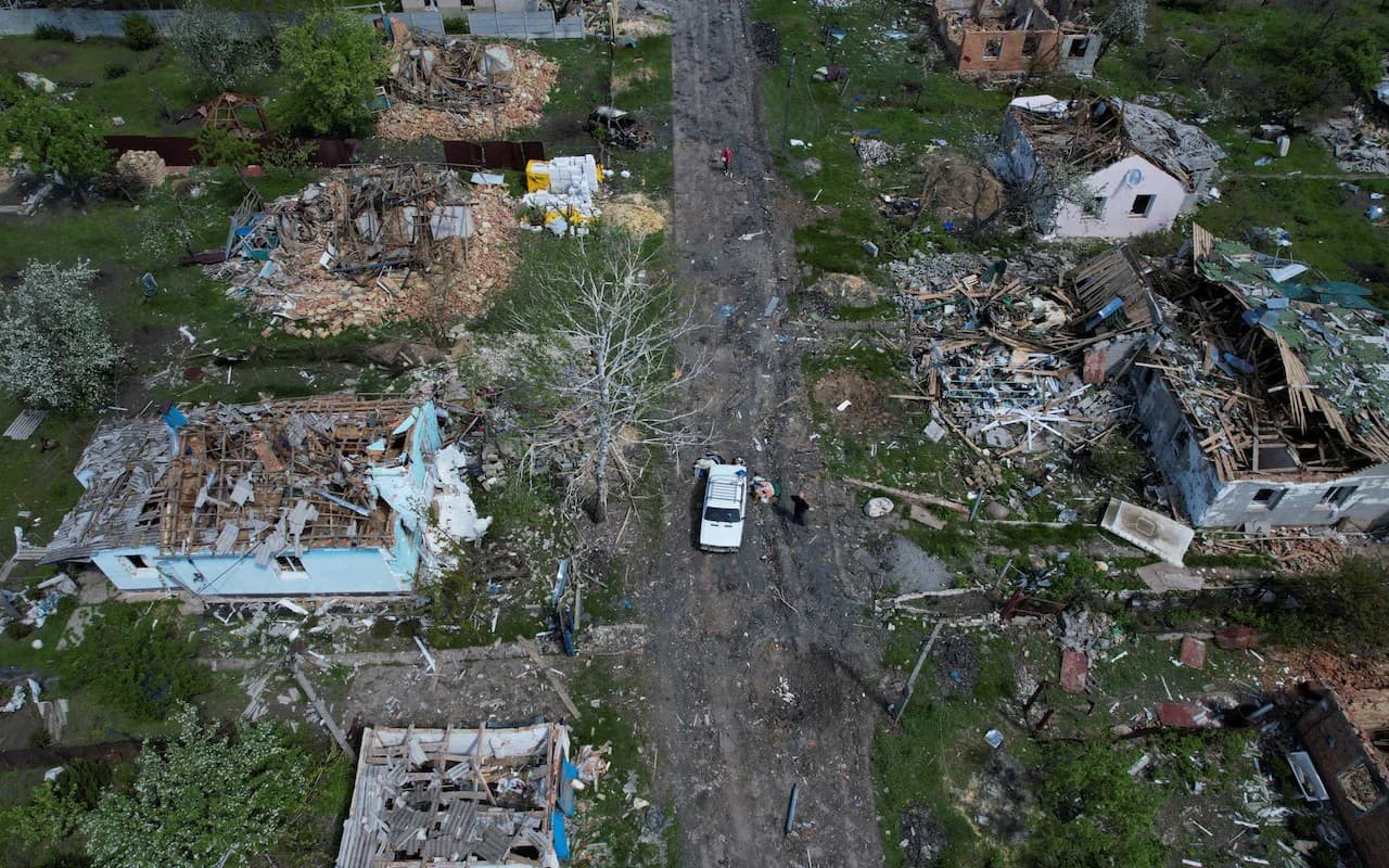 Homes lie destroyed in the village of Vilhivka near Kharkiv