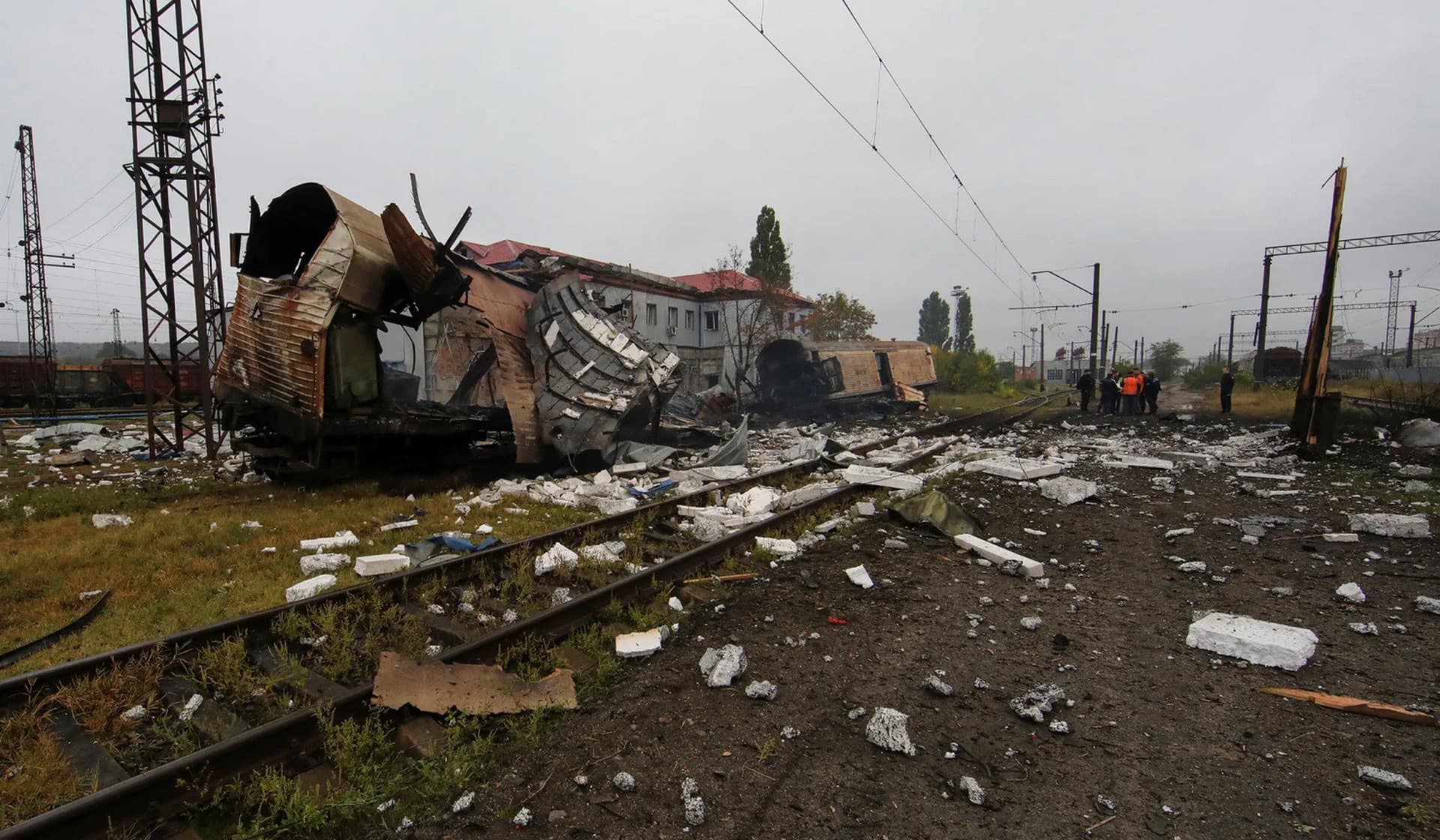 Railway cars destroyed by a Russian missile strike at a cargo terminal in Kharkiv
