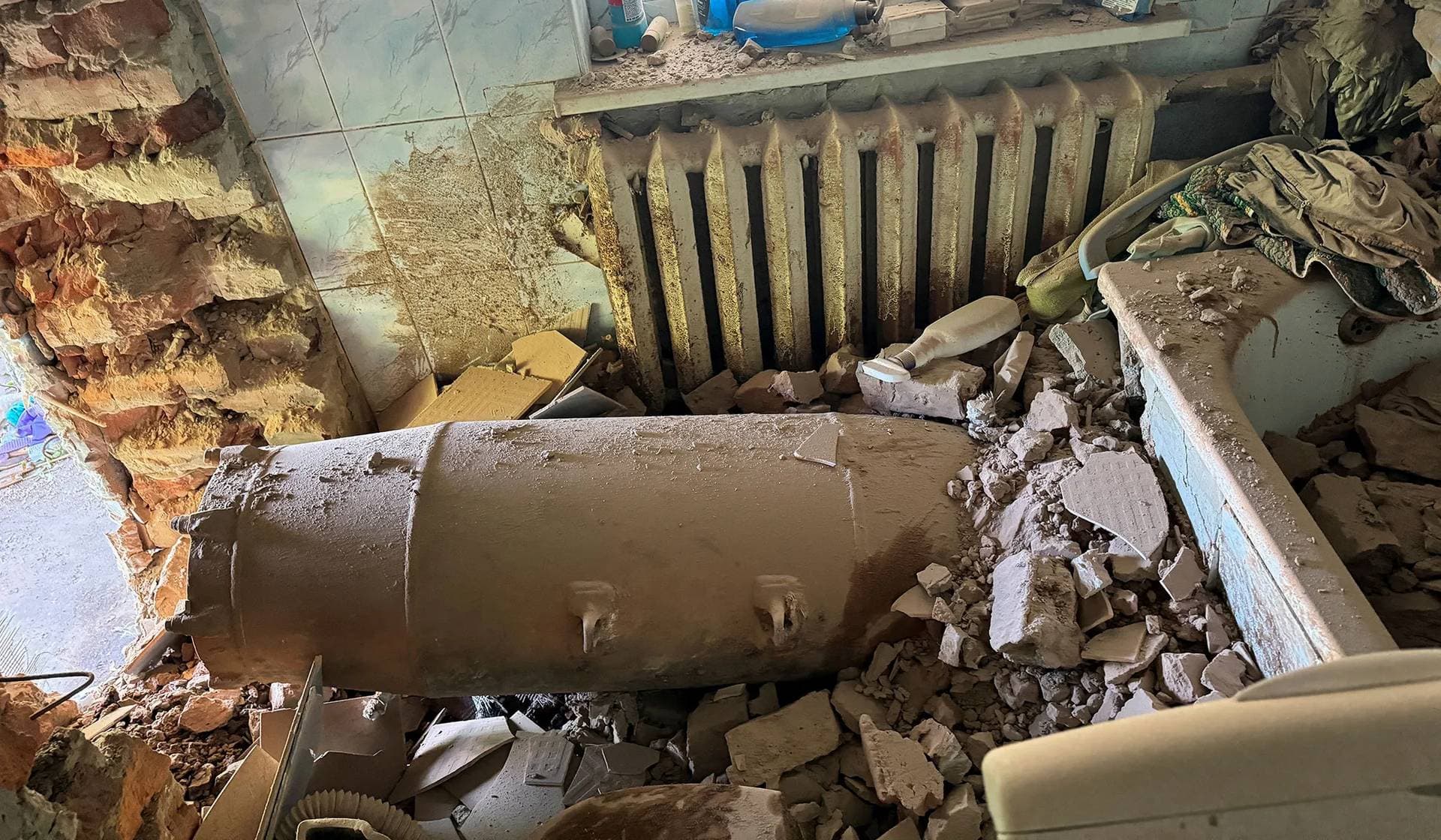 A Russian glide bomb is seen in a private house hit by a Russian air strike in Kharkiv