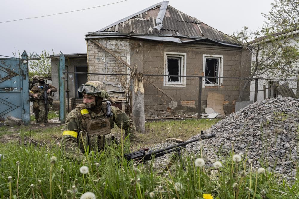 Ukrainian National Guard patrol during a reconnaissance mission in a recently retaken village on the outskirts of Kharkiv
