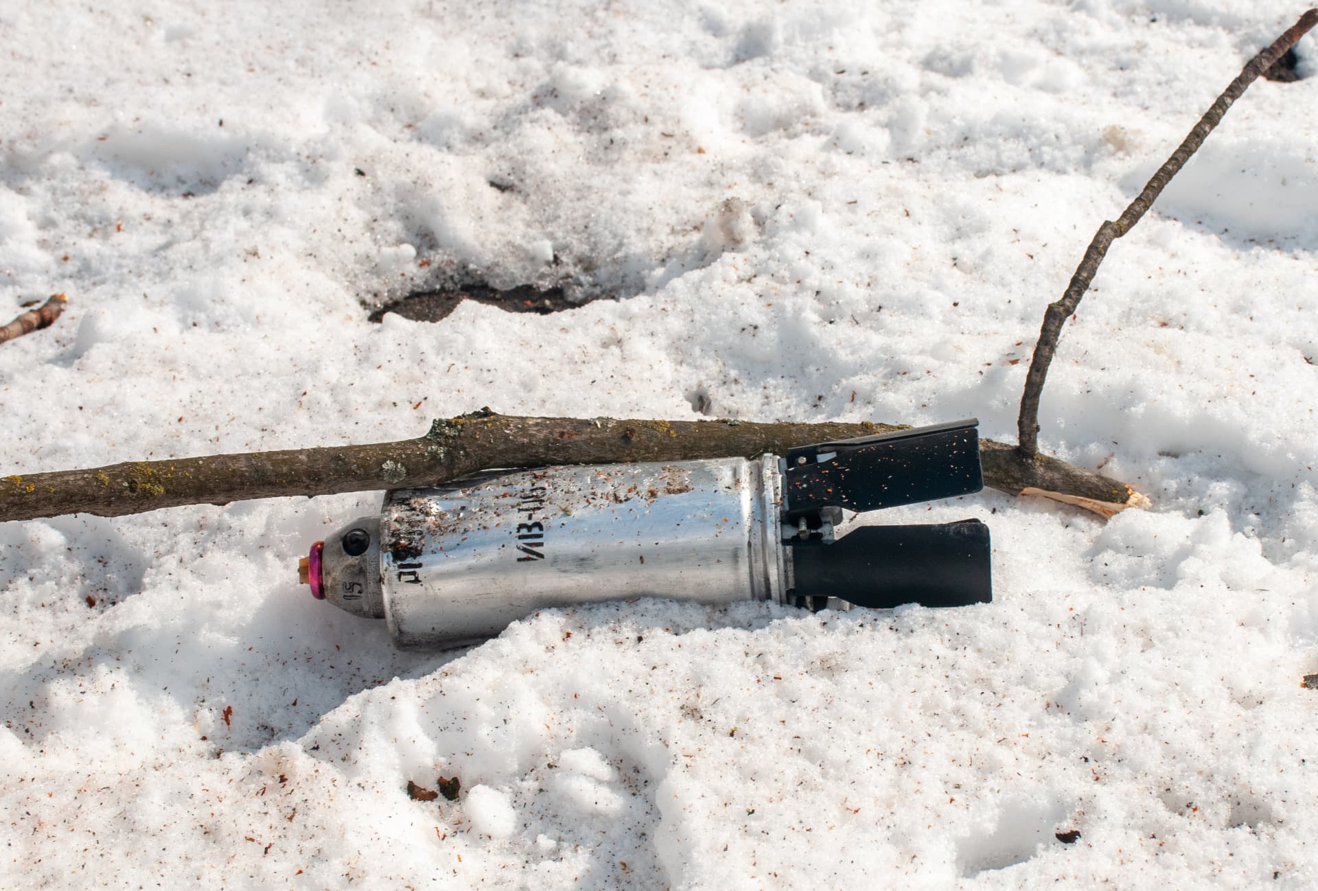 Cluster munition lies in the middle of the street after the shelling of the city of Kharkiv by the Russian military-occupiers