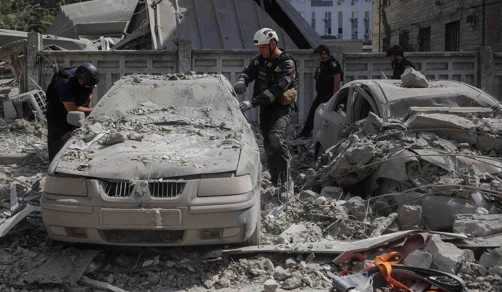 Rescuers work at the site of a Russian missile strike in Kharkiv