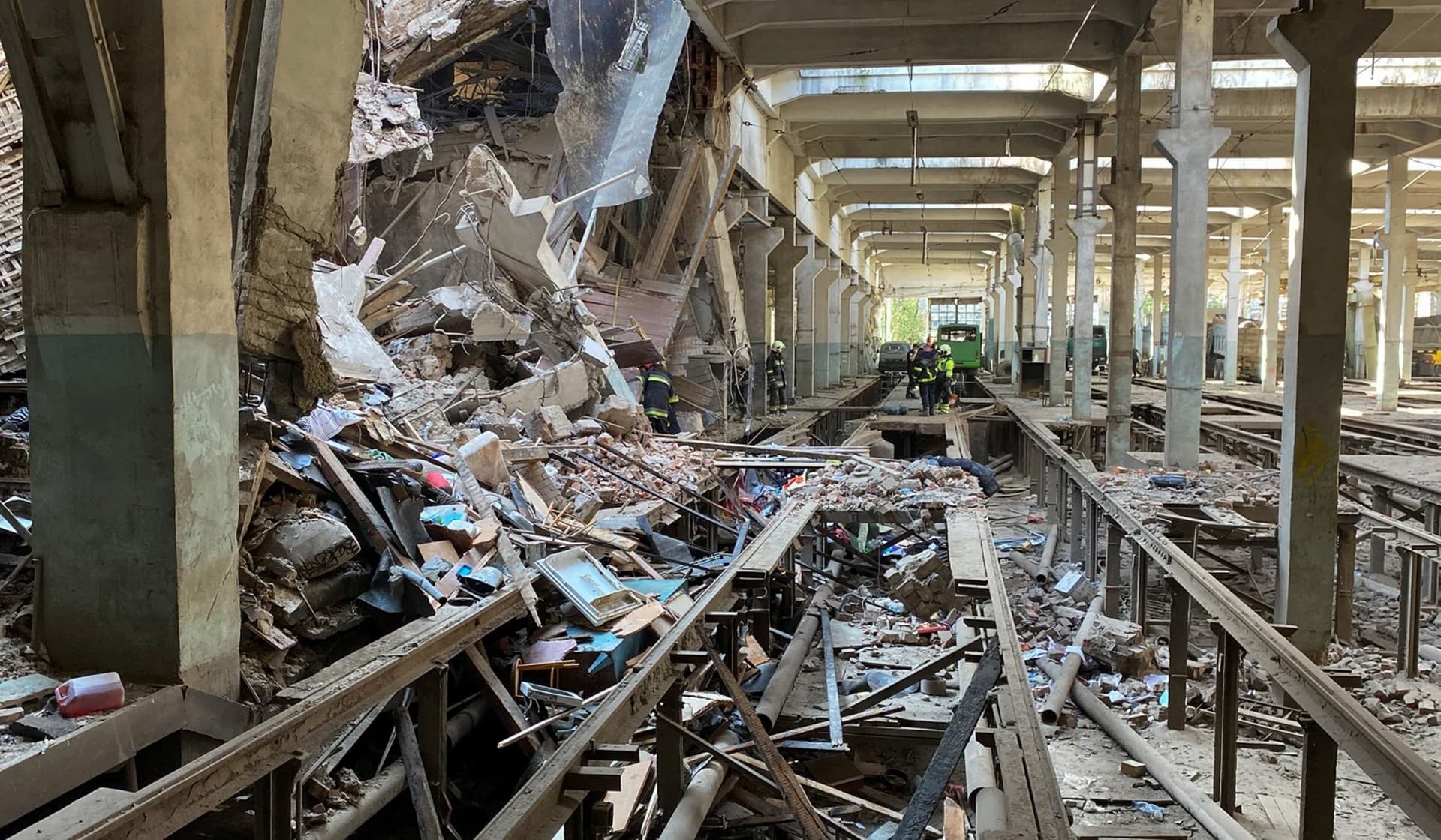 Debris of a residential block of a tram depot hit by a Russian missile strike in Kharkiv