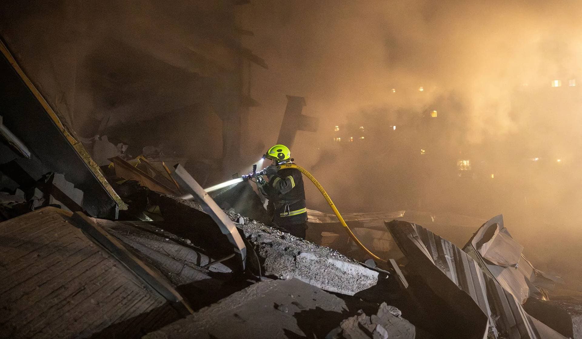 A firefighter works at the site of a Russian missile strike that hit a water purifying station in Kramatorsk