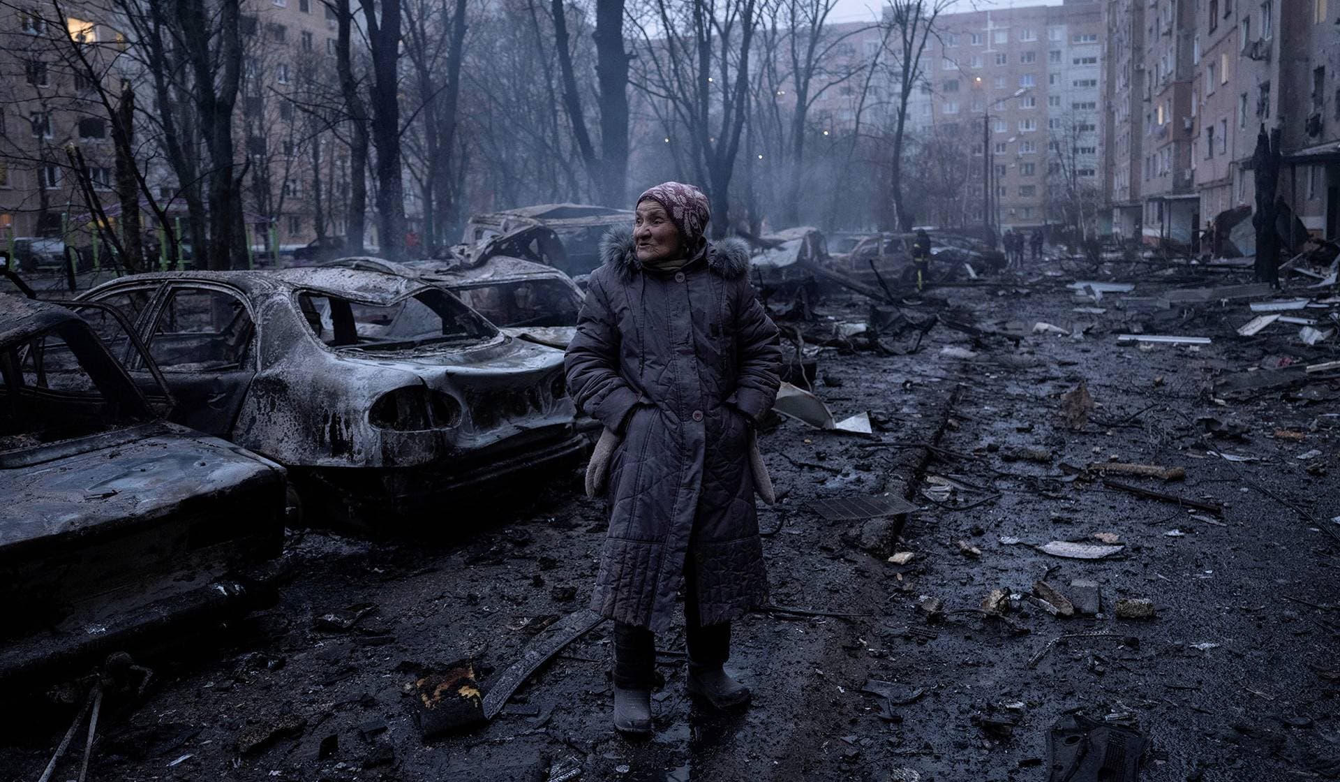 A resident stands at the site of apartment buildings hit by a Russian air strike in Kramatorsk