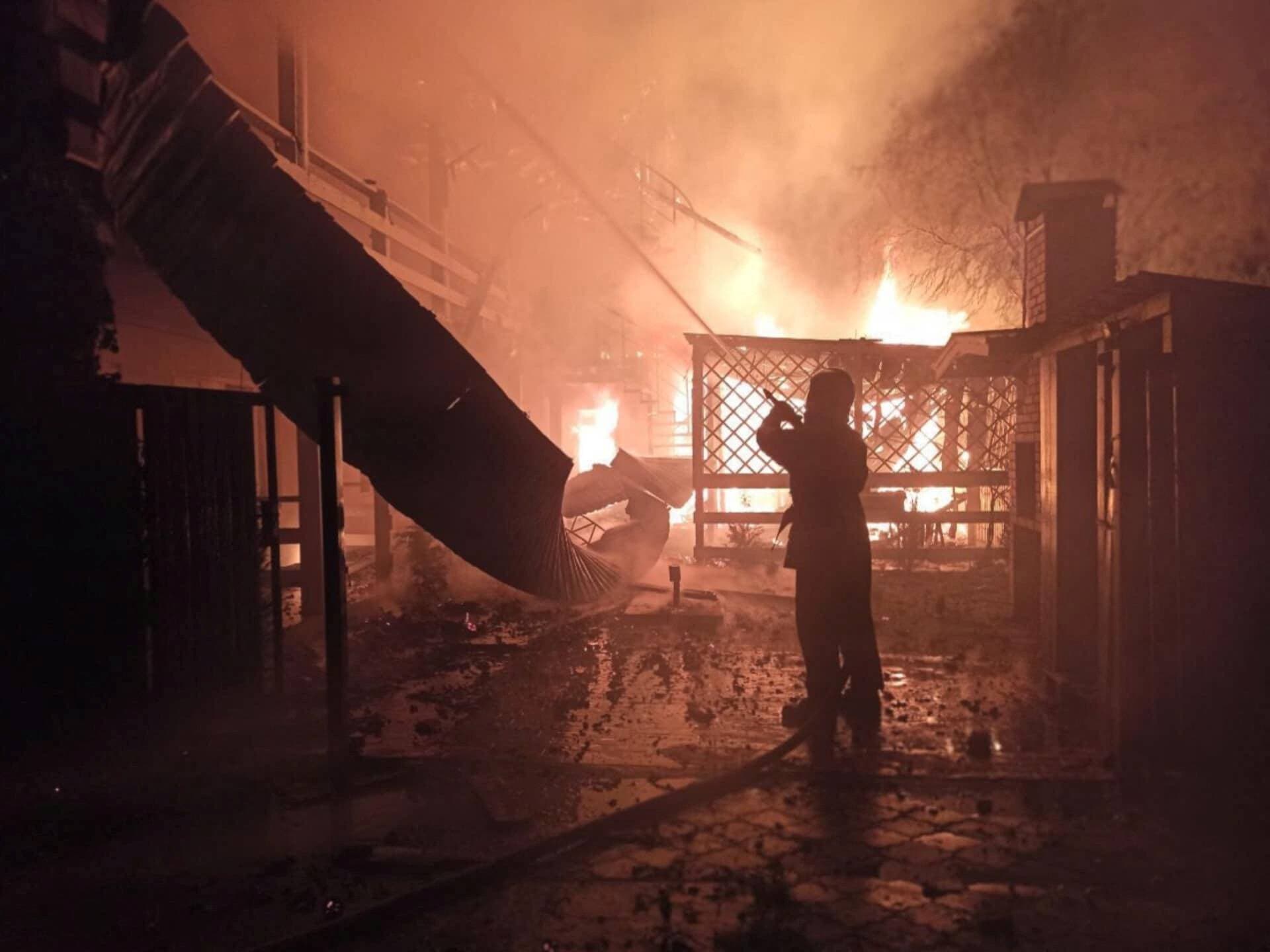 burning storage facilities heavily damaged by a Russian missile strike in Odesa region