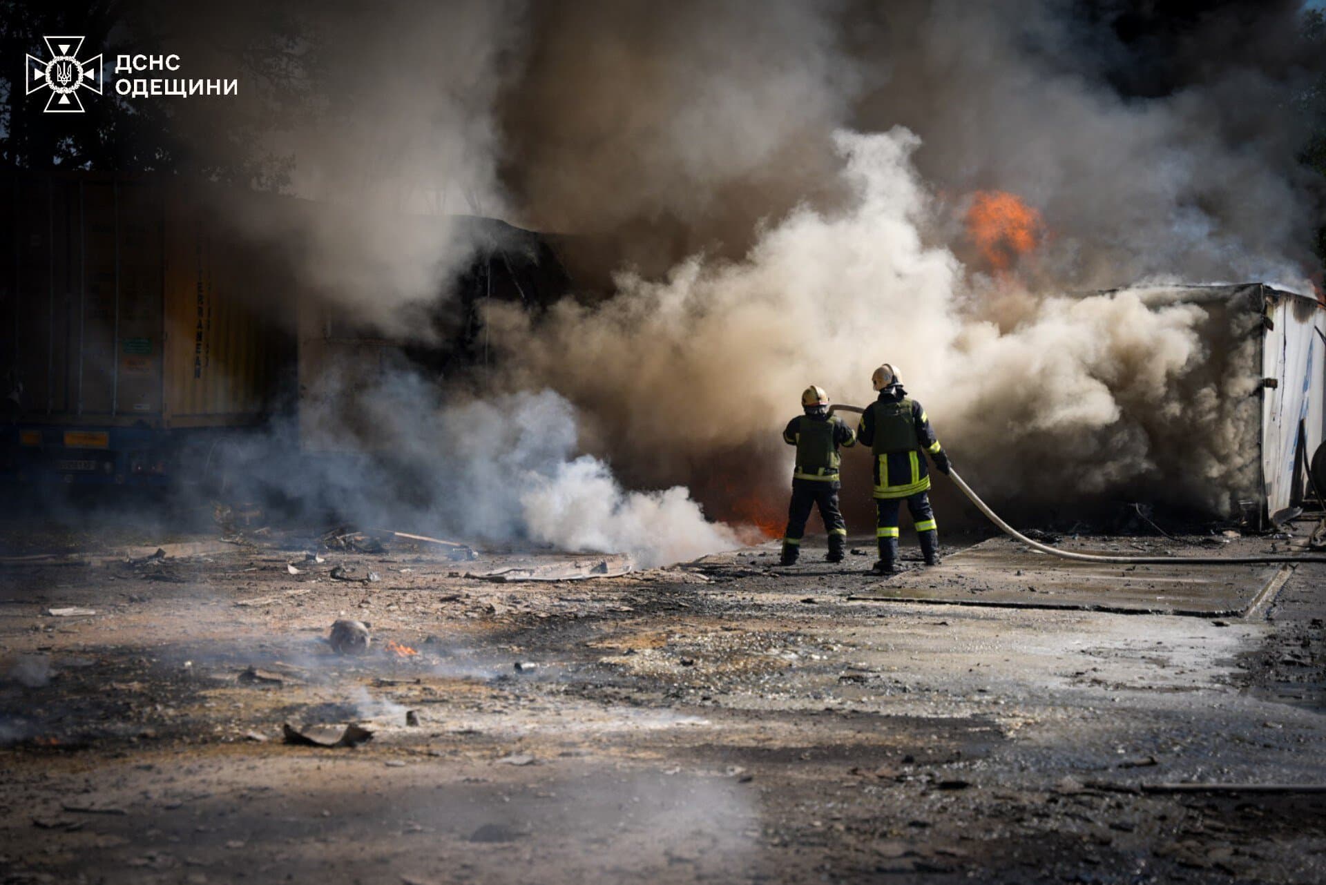 Firefighters work at the site of a Russian missile strike in Odesa region