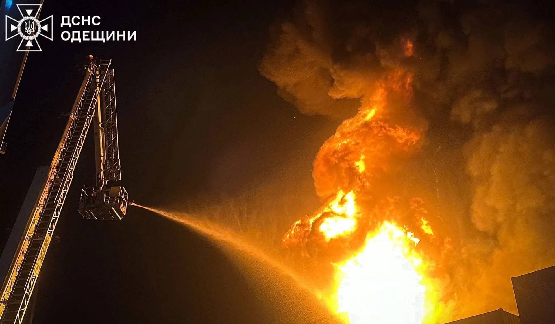 Firefighters work at the site of a Russian drone strike in Odesa Region