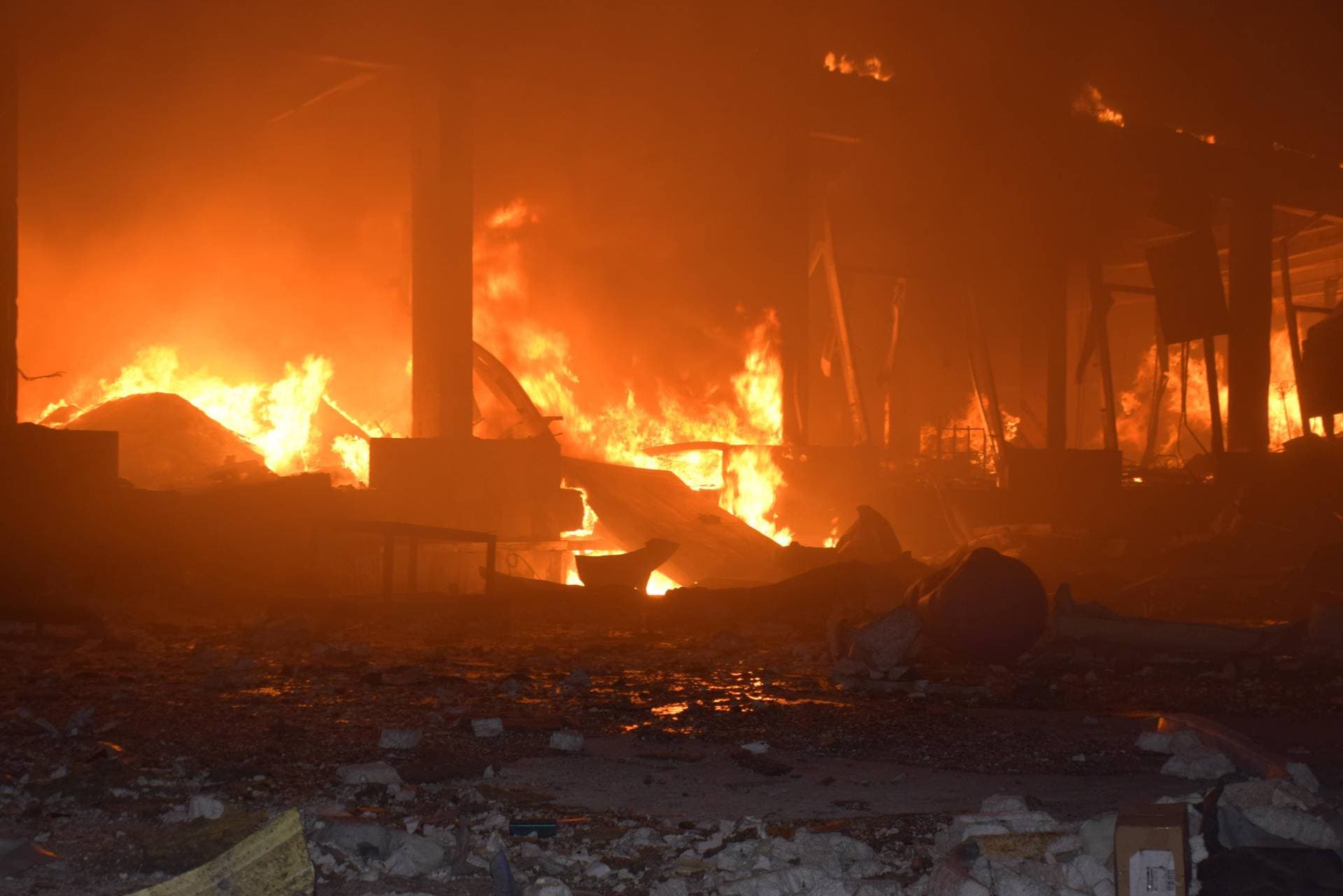 burning storage facilities heavily damaged by a Russian missile strike in Odesa region