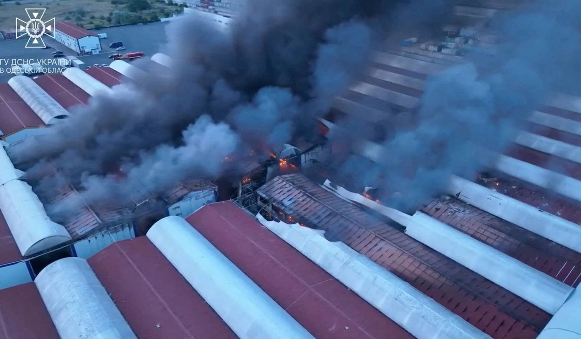 Smoke billows from a fire at a site of storage facilities hit during Russian missile and drone strikes in Odesa