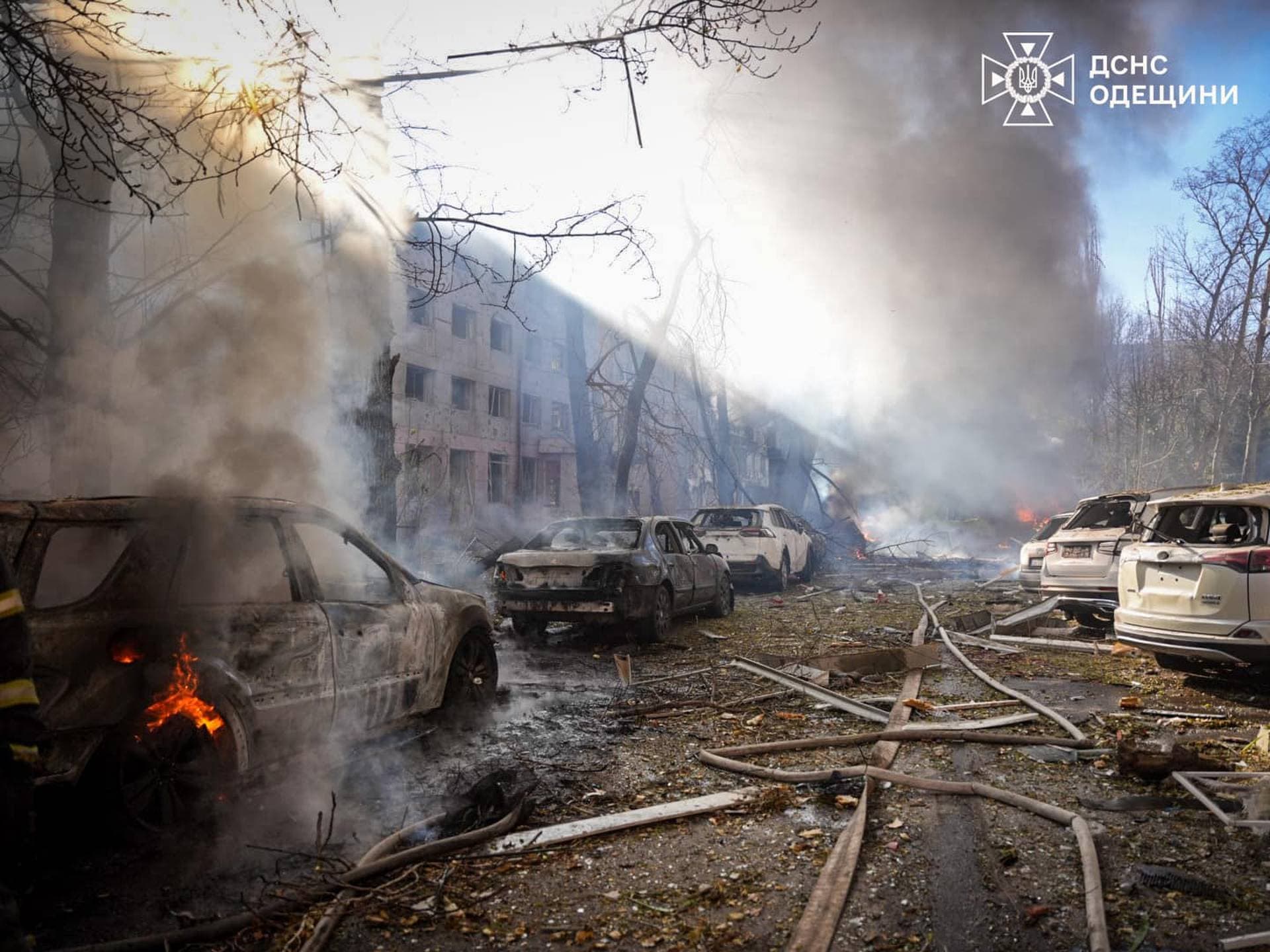 Cars and a building heavily damaged during a Russian missile strike in Odesa