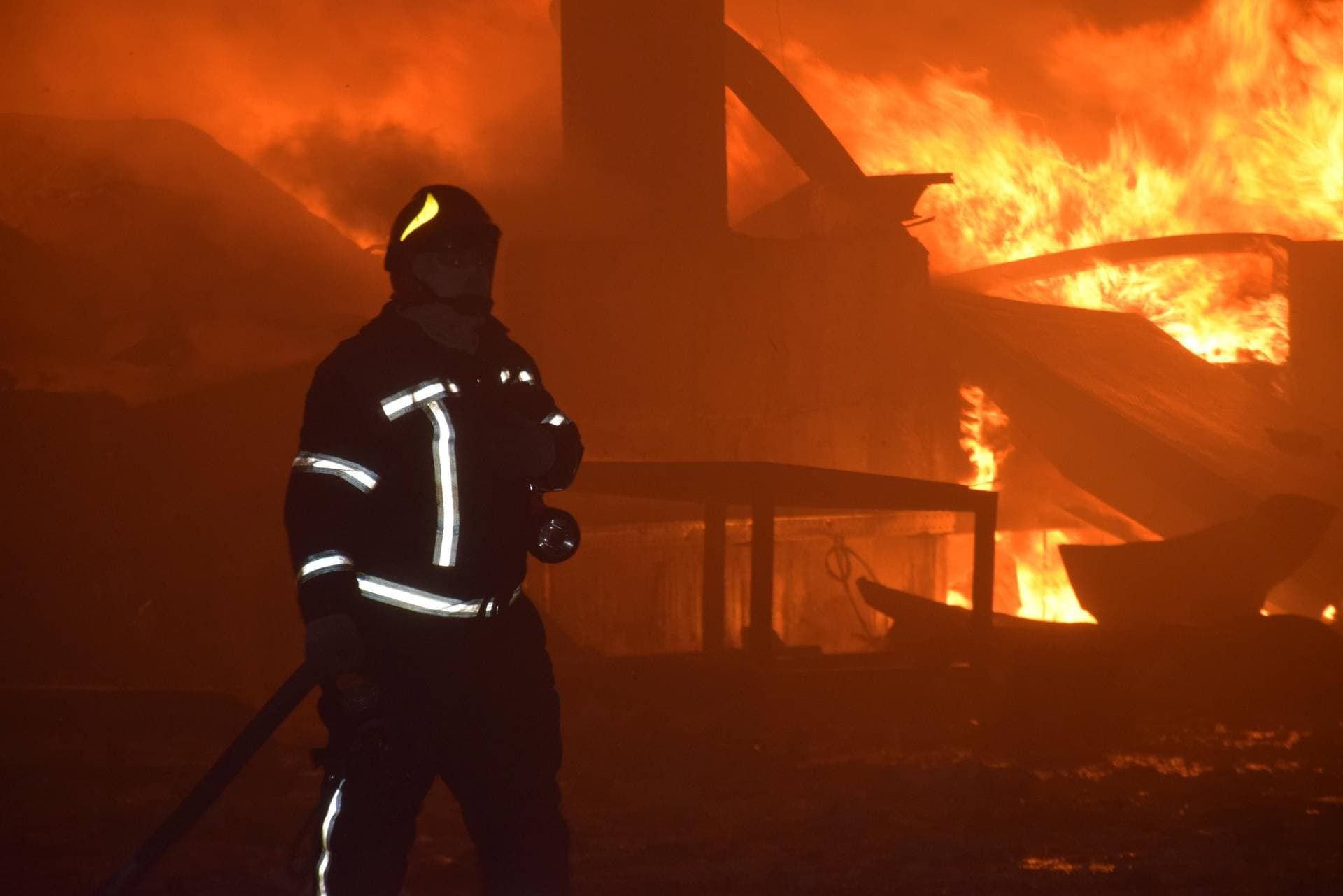 burning storage facilities heavily damaged by a Russian missile strike in Odesa region