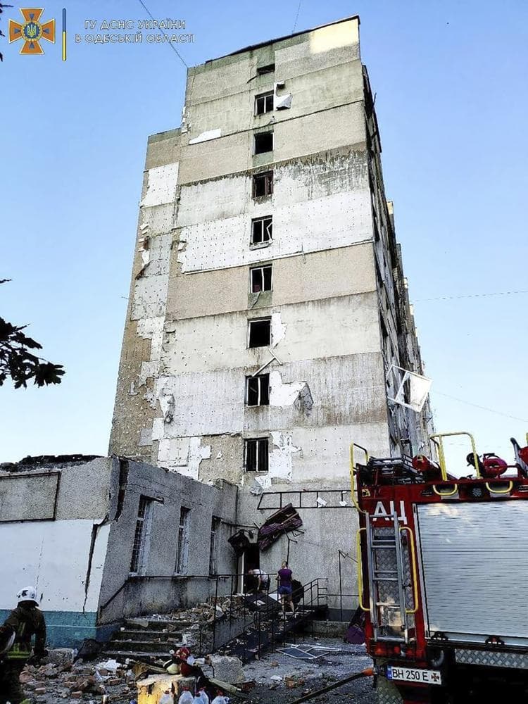 a damaged residential building is seen in Odesa