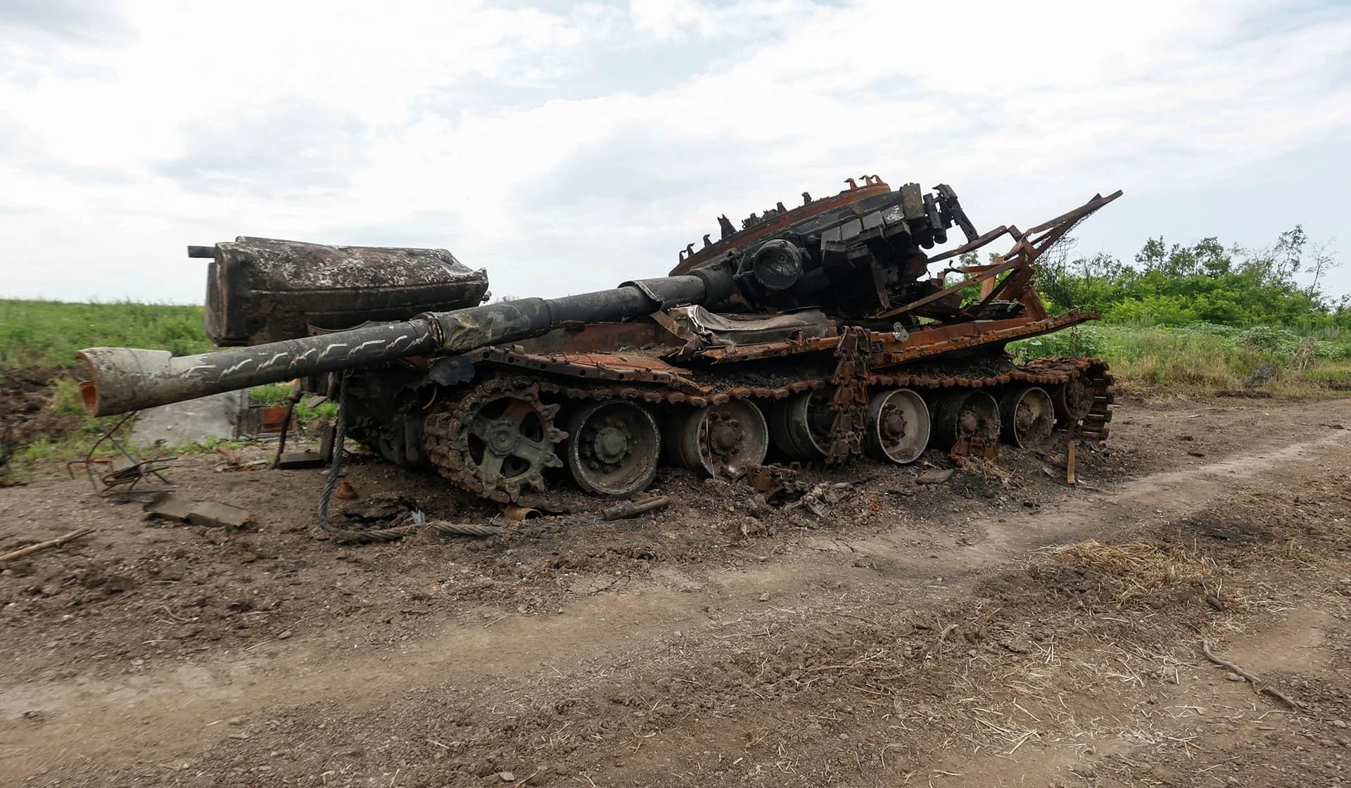 A destroyed Russian tank in the village of Novodarivka