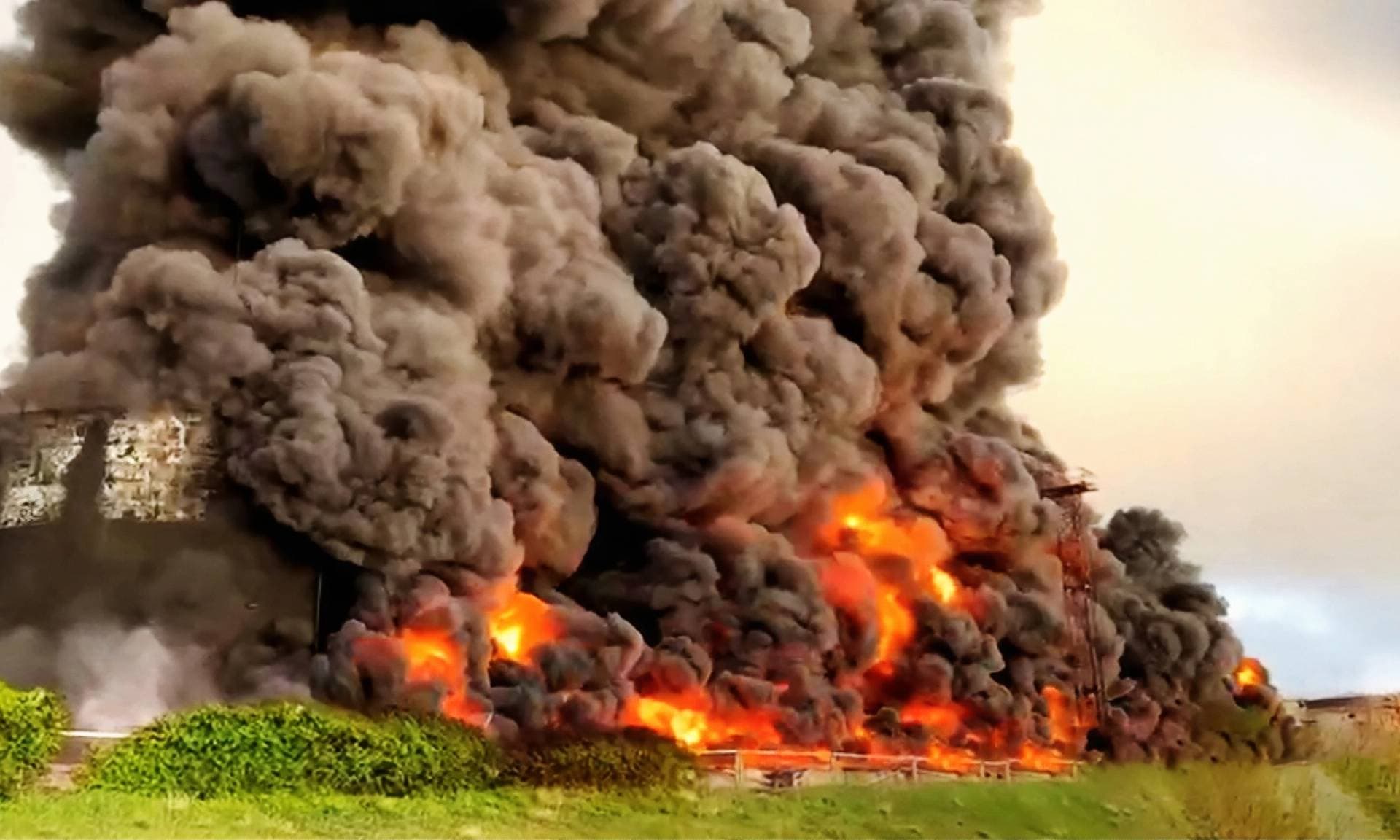 Smoke rises following an alleged drone attack on oil depot in Sevastopol